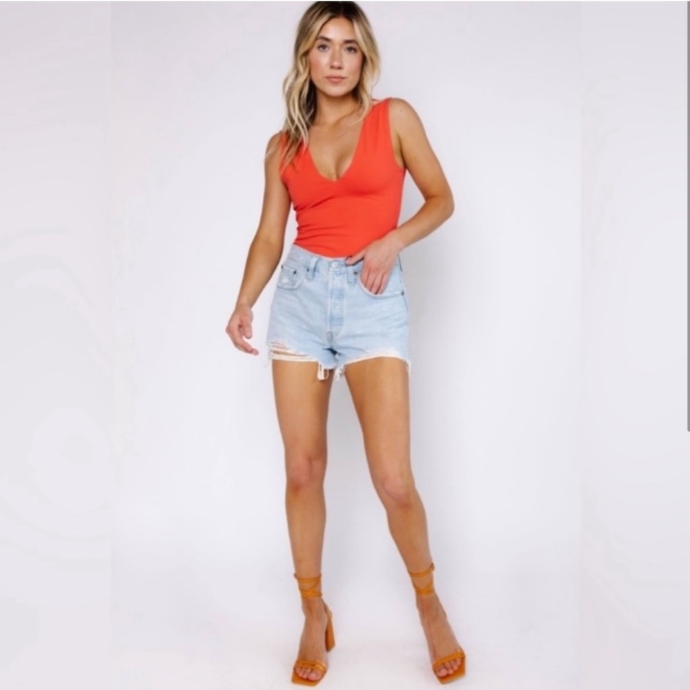 Free People Keep It Sleek Low-Back Bodysuit - Pink
Poinsettia
